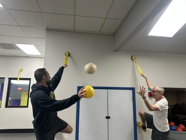 One-on-one exercise coaching at Spine and Scoliosis Clinic